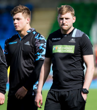 Finn Russell (right) and Huw Jones have a point to prove to Dave Rennie in Belfast.