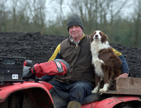 John Davidson farms manager, with dog Peg, at Penicuik Estate uses  thermal hydrolysis on the land as fertilizer. See Centre Press story CPPOO; "Poo cakes" made out of human waste intended to be used as fertiliser have been poo-pooed by farmers who say it may see crops rejected by the whisky industry. The unique idea was put forward to farmers as a cost-effective alternative to expensive artificial fertilisers which can cost up to £250 per tonne. Despite the human waste cakes costing only £2.45 per tonne - the National Farmers Union has warned its members against using the "poo cakes". The NFU believes that crops using the thermal hydrolysis -- or TH cakes -- could be rejected by the money-spinning whisky industry. Organic matter is removed from 165 tonnes of sludge processed at Scottish Water's Seafield treatment site every day.