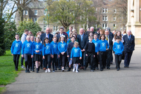 Children from Round Tree walk with SNP Dundee City Council leader John Alexander and Dundee West SNP MP Joe Fitzpatrick