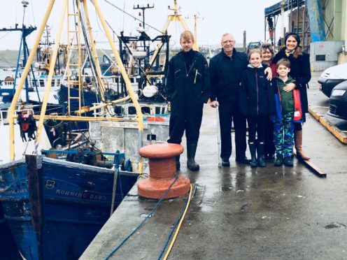 From left, Stewart Curren, current skipper, Jim Swankie, Jim's granddaughter Adriana Schofield, Jim's wife Jane Swankie, Jim's grandson Aaron Schofield and Jillian Schofield, Jim's daughter.