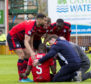 Dundee's Genseric Kusunga before being stretchered off.