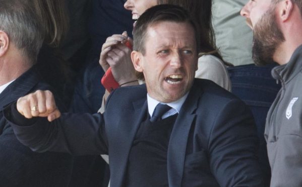 Neil McCann celebrates Dundee's winner last week. against St Johnstone.