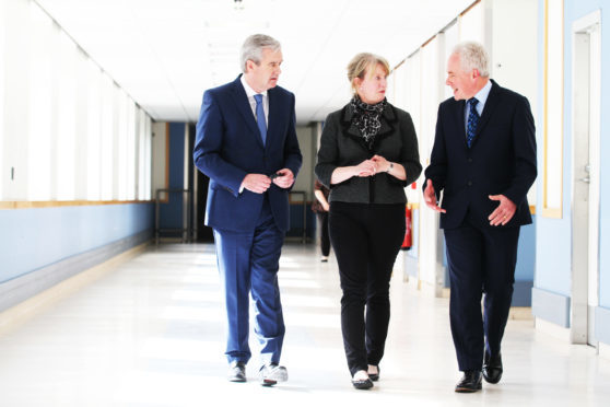John Brown, interim chairman, health secretary Shona Robison and the new NHS Tayside chief executive Malcolm Wright.