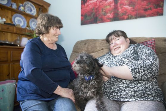 Margaret and Jackie Kelly with Jack the dog.