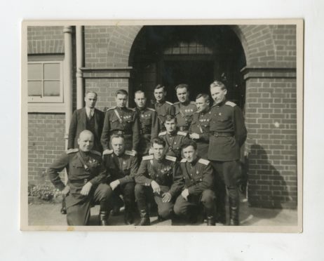 A few of the Soviet airmen who arrived in Scotland in 1943 to undertake top secret training at Errol Airfield, including Commander Peter Kolesnikov (1st row, left)
