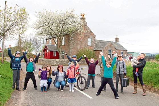 Celebration celebrating the stay of execution for Stracathro Primary School.