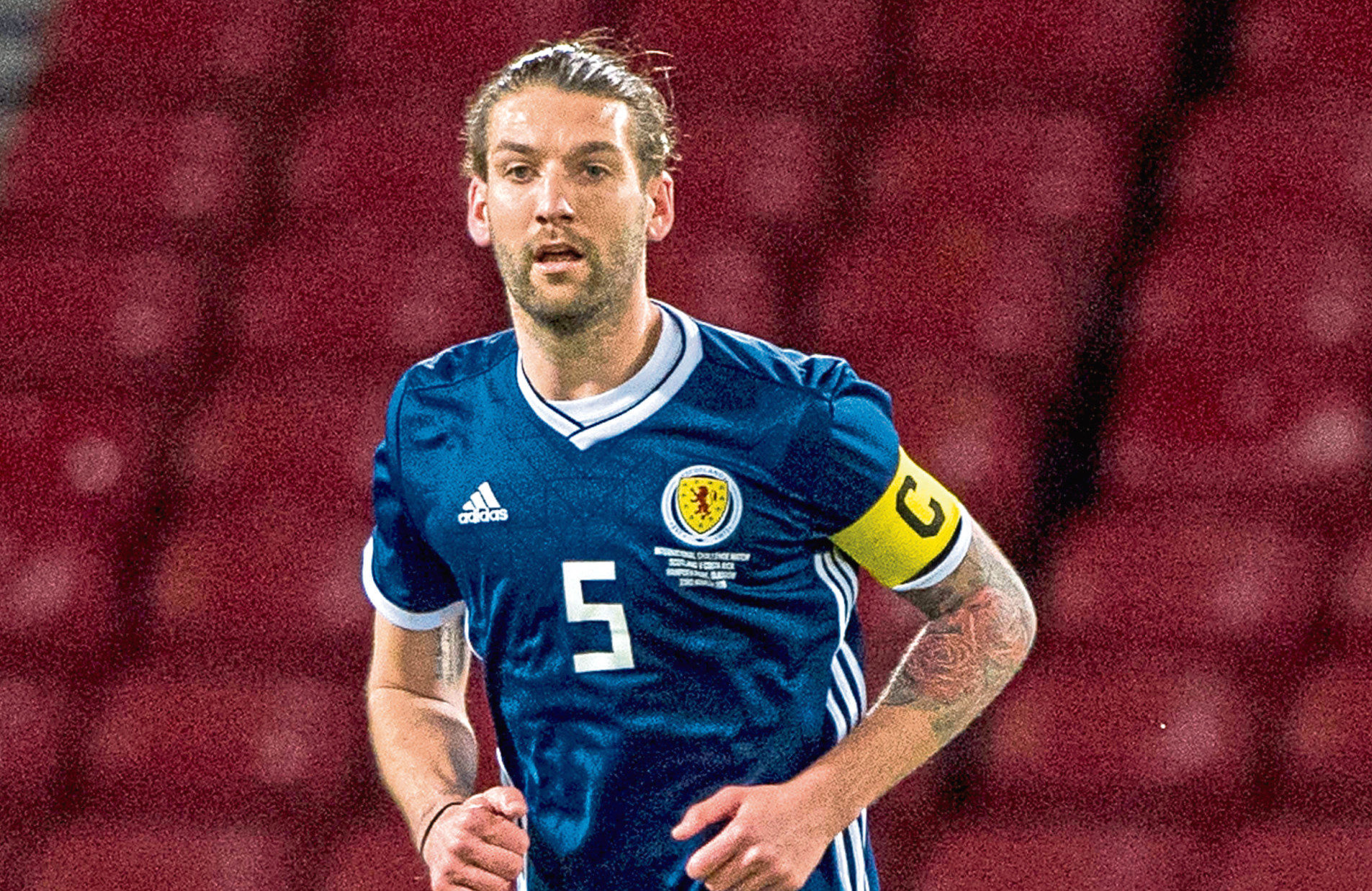 Charlie Mulgrew in action for Scotland.