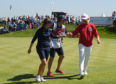 Georgia Hall and Matt Wallace congratulate each other after their opening tie finished in a draw at GolfSixes. Both teams later progressed to the knockout stages.