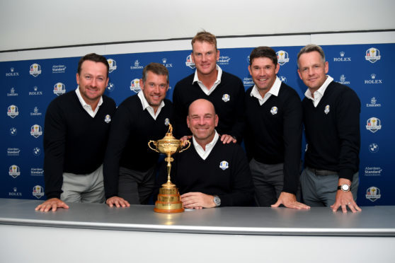 Graeme McDowell, Lee Westwood, Robert Karlsson, Padraig Harrington and Luke Donald with Thomas Bjorn after yesterday's Ryder Cup announcements at Wentworth.