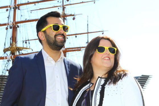 Transport Minister Humza Yousaf with Cllr Lynne Short, sporting their Sunny Dundee sunglasses at Discovery Point,at the launch of the NaviGoGo app