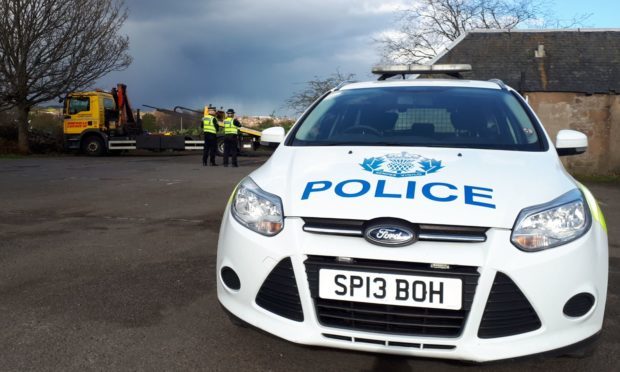 Police at Caird Park on Wednesday.