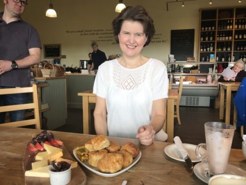 Jane Stewart of the St Andrews Farmhouse Cheese Company with a selection of scones and locally made cheeses