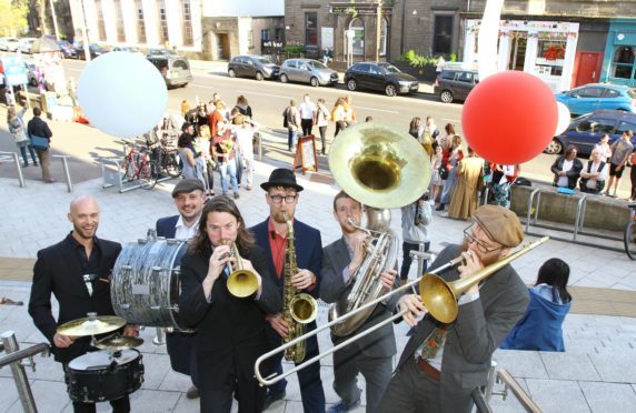 The Brass Gumbo band entertaining at the opening of the DJCAD Degree Show.