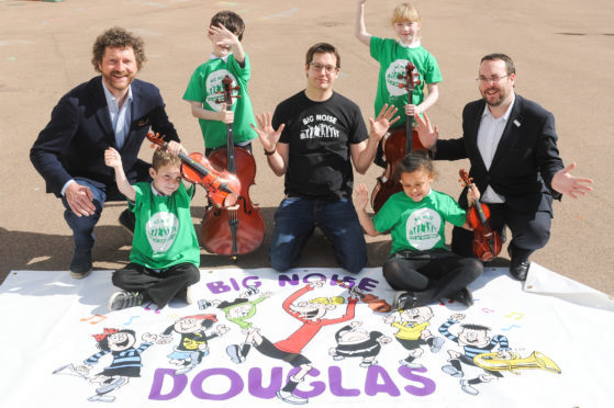 Optimistic Sound chairman Chris van der Kuyl, Big Noise Douglas team leader Andy Thorn and Dundee City Council’s convener of Children and Families Service Councillor Gregor Murray with pupils (from left) Lewis Gruar, Tyrese Bell, Amy Clark and Ava Mcobro.