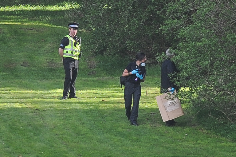 Forensic officers investigate the scene at Caird Park Golf Club.