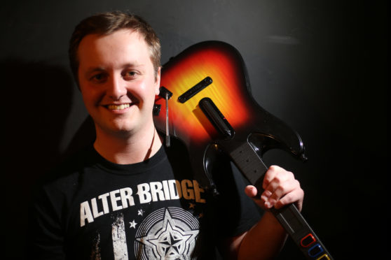 Jordan Siddalls took part in a 12-hour Guitar Hero session in memory of his step-father.