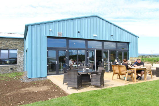 Outside seating at the Longparke Cafe.