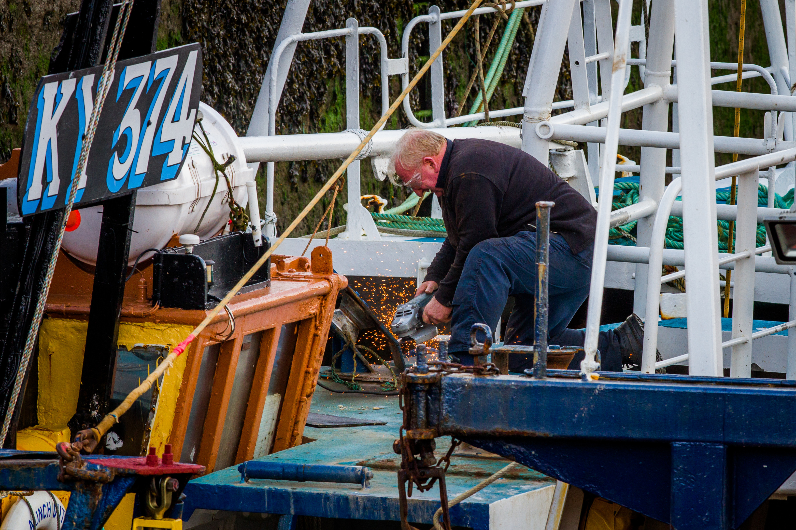 Picture shows maintenance work on some of the boats in Pittenweem Harbour.