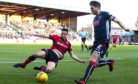 Dundee's Cammy Kerr (left) and Marcus Fraser in action.