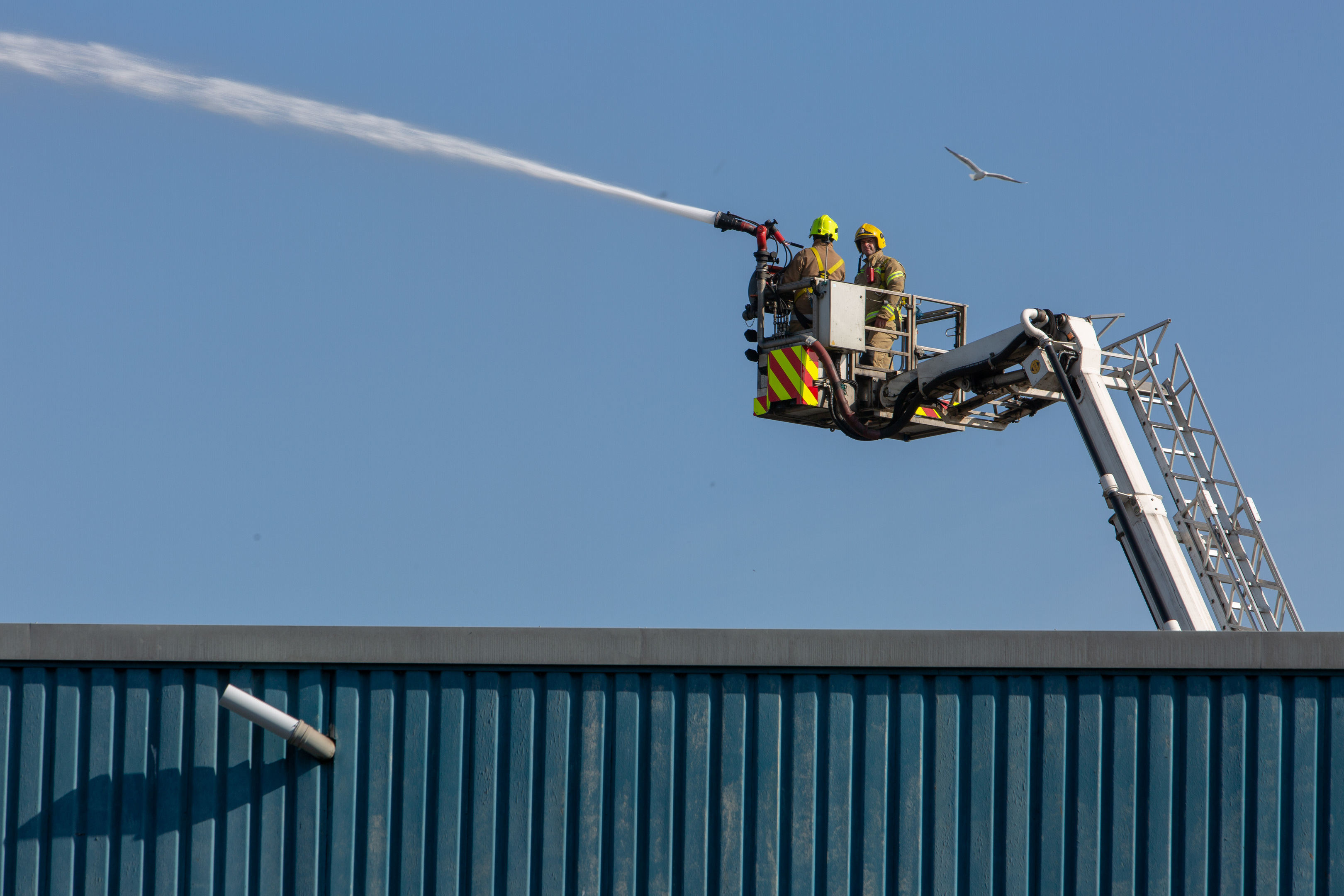 Fire damage and fire fighters on scene at Southfield Industrial Estate.