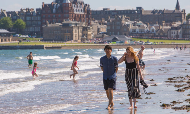 Locals enjoy the heatwave in St Andrews in May 2017.