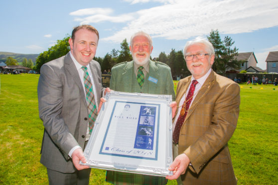 Auchterarder wrestler Bill Ross was inducted into the Professional Wrestling Hall of Fame. From left:, Hall of Fame founder Bradley Craig, Bill Ross and Provost Dennis Melloy.