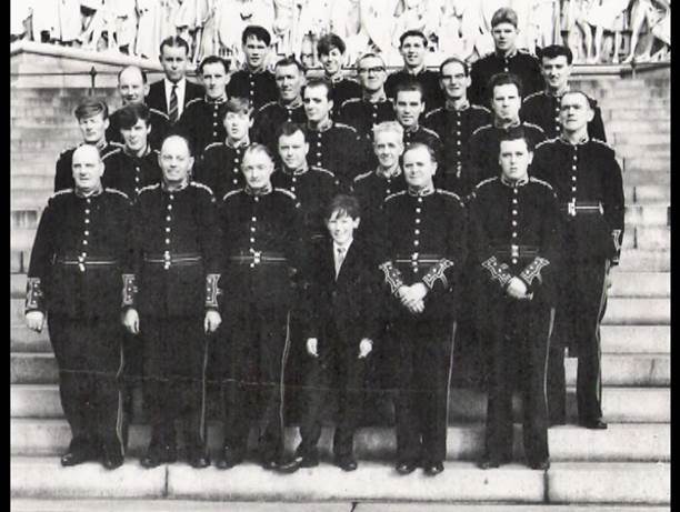 The band on the steps of the Albert Hall London, 1964. John Wallace back row, central, John Miller from row third from left wee boy too small for uniform 