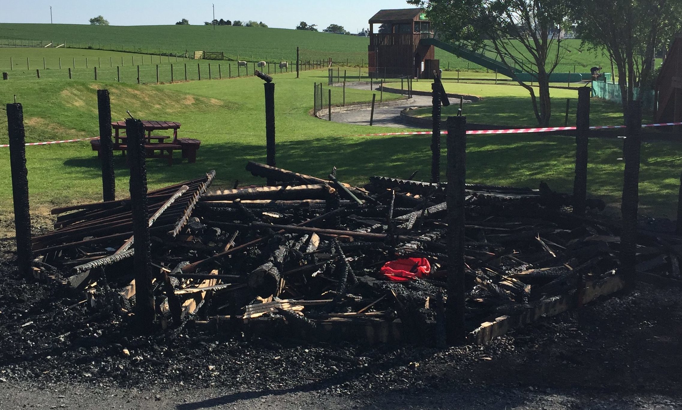 The burnt-out children's wigwam at the adventure park.