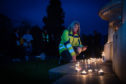 Tracy Swan, who lost her daughter to suicide, led the torchlight walk through Perth.