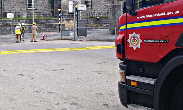 Firefighters investigating the explosions at Dunfermline Bus Station.