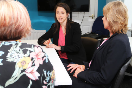 SNP MSP Mairi Gougeon and Ann Moulds, the Founder and chief executive of Action Against Stalking, at the Women's Rape and Sexual Abuse Centre in Dundee. The incident involving the binman took place during their visit.