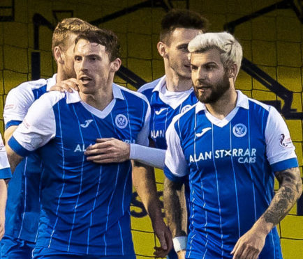 David McMillan celebrates his penalty at Hamilton.