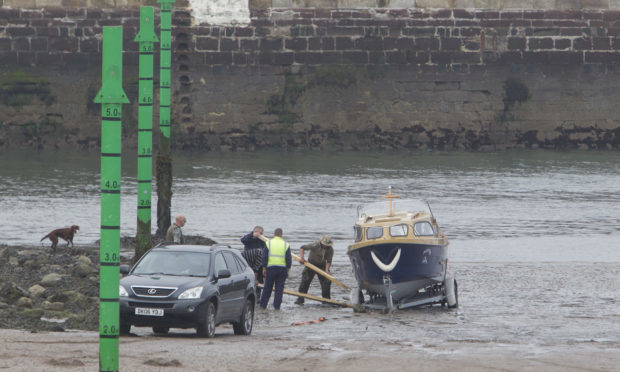 The boat was stranded at Arbroath harbour after the slipway was used against advice