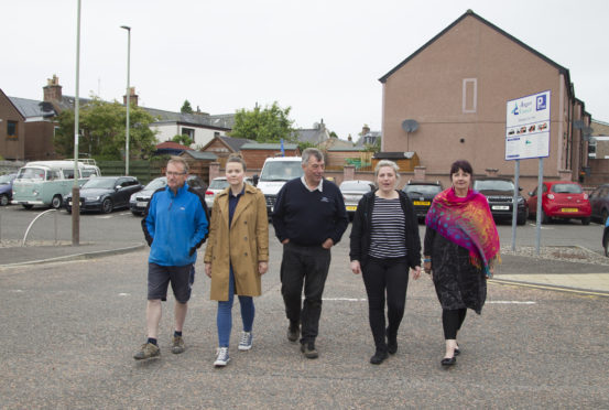 Jim Stewart, Laura Walton, Barrie Ewart, Nicola Ewart and Councillor Julie Bell in the Glengate Car Park, Kirriemuir.