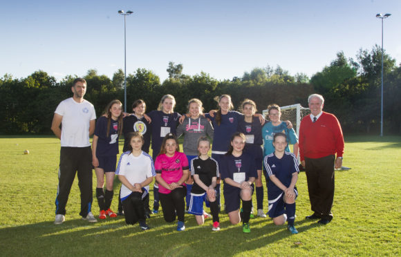 Forfar Farmington Under 15 side with Coach Robert Kirkpatrick (left) and Chairman Colin Brown(right).