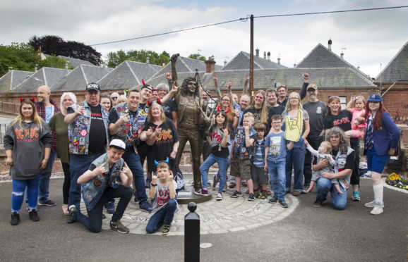 AC/DC fans at the Bon Scott statue in Kirrie.
