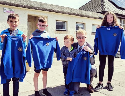 Mr Wilson with (from left) Donald Barclay, Ross Mitchell, Alexander Barclay and Katie Mitchell who are all pupils at Bervie Primary School.