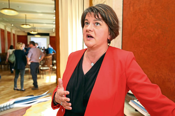 DUP Leader Arlene Foster speaks to the media at Stormont Parliament in Belfast, following her comments at the weekend about the partys "red line" on customs arrangements post-Brexit, which were interpreted by some as a veiled threat to pull the plug on her party's confidence and supply deal with the Tories. PRESS ASSOCIATION Photo. Picture date: Monday June 4, 2018. Mrs Foster has denied threatening the Prime Minister over Brexit, insisting she does not think Theresa May would even consider a deal that would treat Northern Ireland differently. See PA story POLTICS Brexit Foster. Photo credit should read: Niall Carson/PA Wire