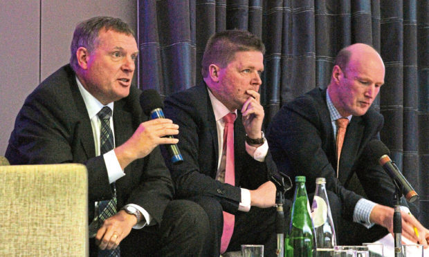 Panellists Mike Galloway, economist Chris Brodie and Sandy Richardson of V&A Dundee speak at the first Dundee Economic Summit in 2012.