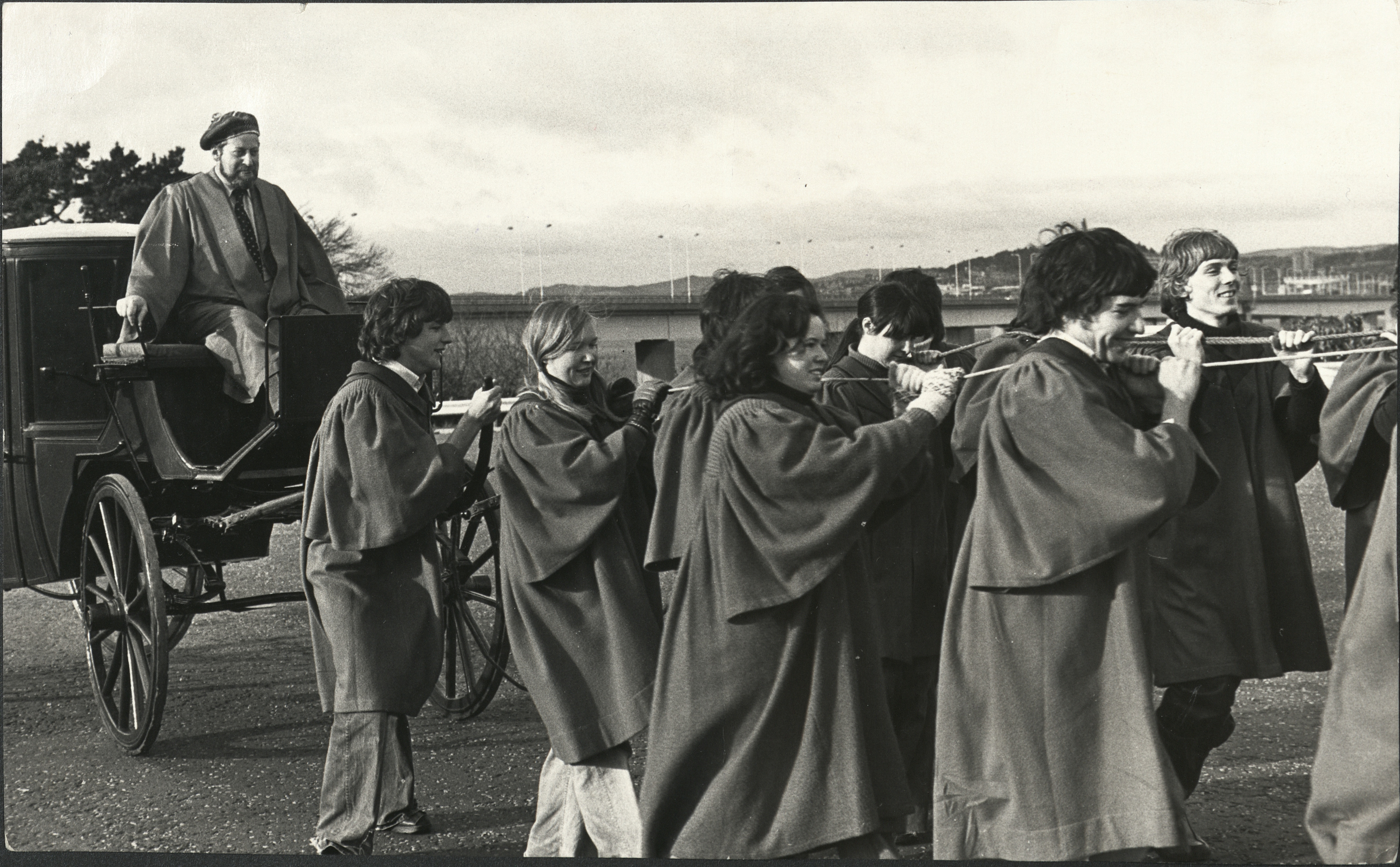 Clement Freud being hauled over the Tay Road Bridge in a carriage by students of Dundee University in 1977.