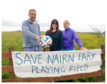 Community council member Angus Meldrum to pose in front of under threat kids football pitch in Elie ltr Angus Meldrum, Carol Birrell, Sandy Bingham