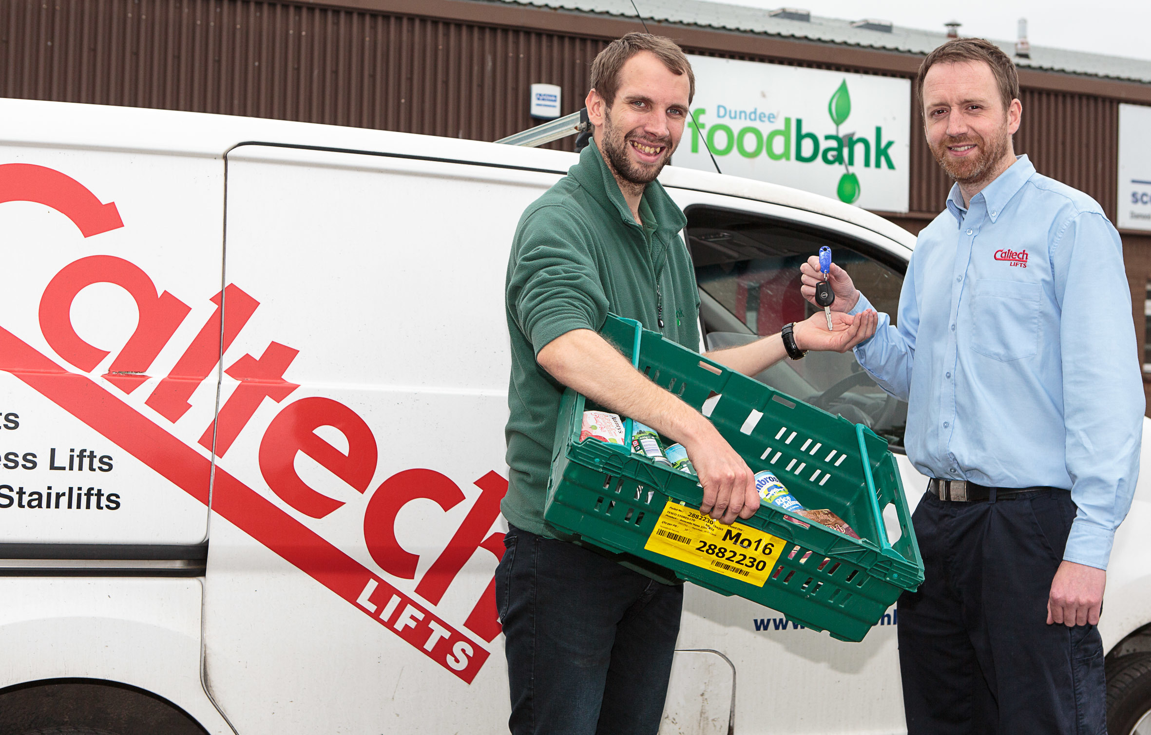 Caltech Lifts managing director Andrew Renwick (right) hands over their spare van to Dundee Foodbank warehouse coordinator Michael Calder.