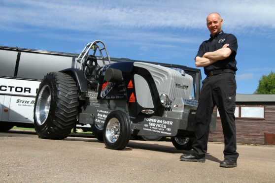 Martin Ross beside his Fendt 612 LSA tractor "Dieselross"