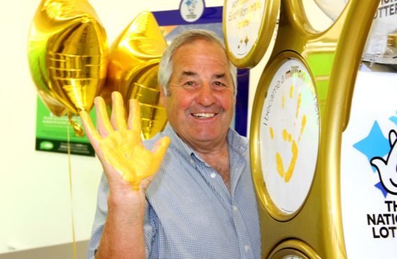 Lottery winner Raymond Storey was at Asda Myrekirk to launch the new gold playstation.