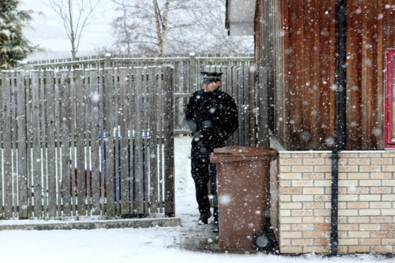 Police on the scene at South Road, Dundee