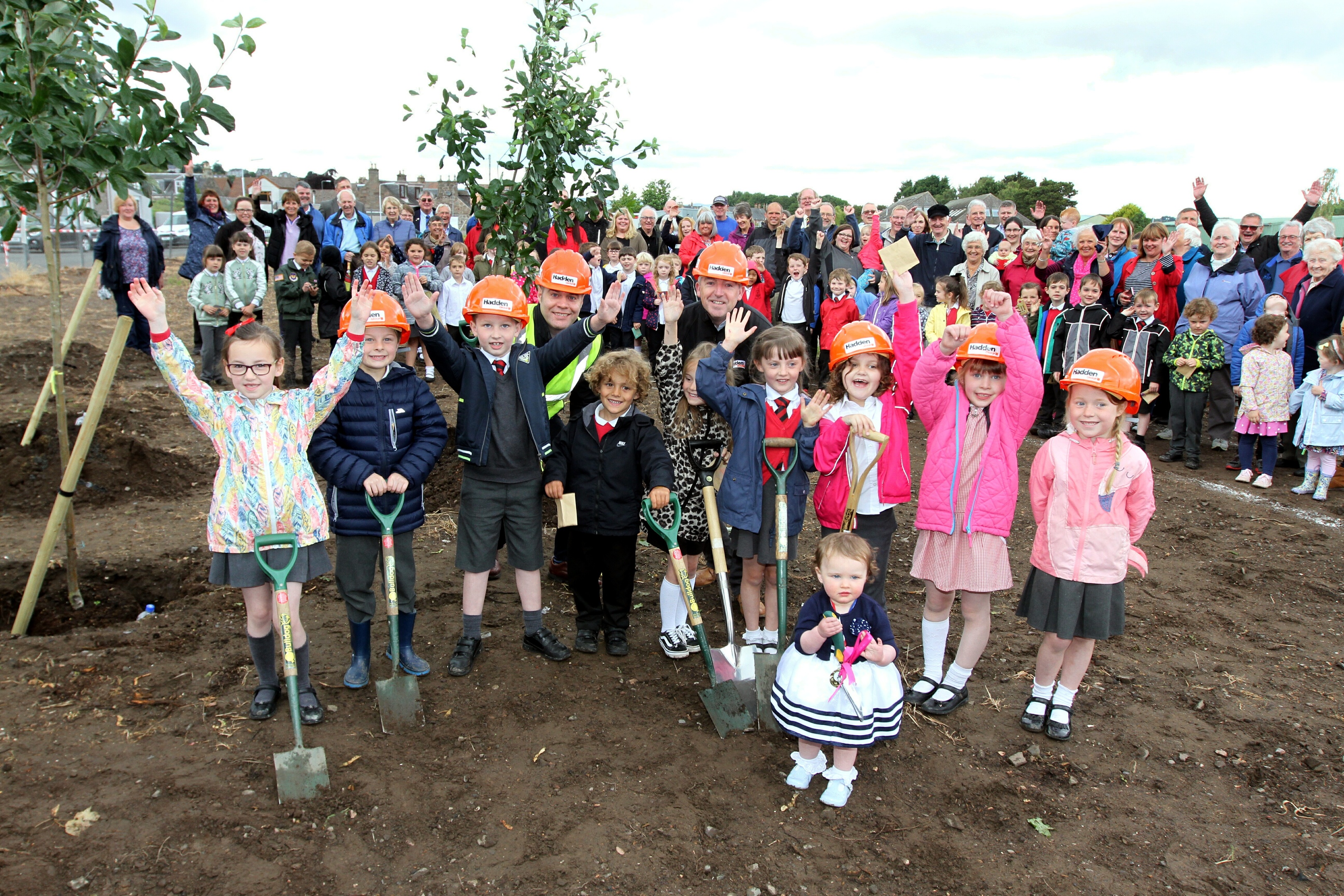 Work begins on Tayport's new Community Hub. Pictured: Derrick Brown & Stephen Lynas from Hadden Construction with Sophie Rennie, Marcus Hegarty, Kai Bates, Maxim Al - Horoub, Meghan McDermott, Lucy Moran, Ivy Lennox, Beth McCallum & Evie Farmer from Tayport Primary school, & in front Aria Abigail Anderson.