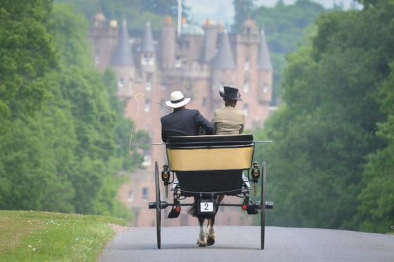 Participants in the Attelage de Tradition on the drive to Glamis Castle