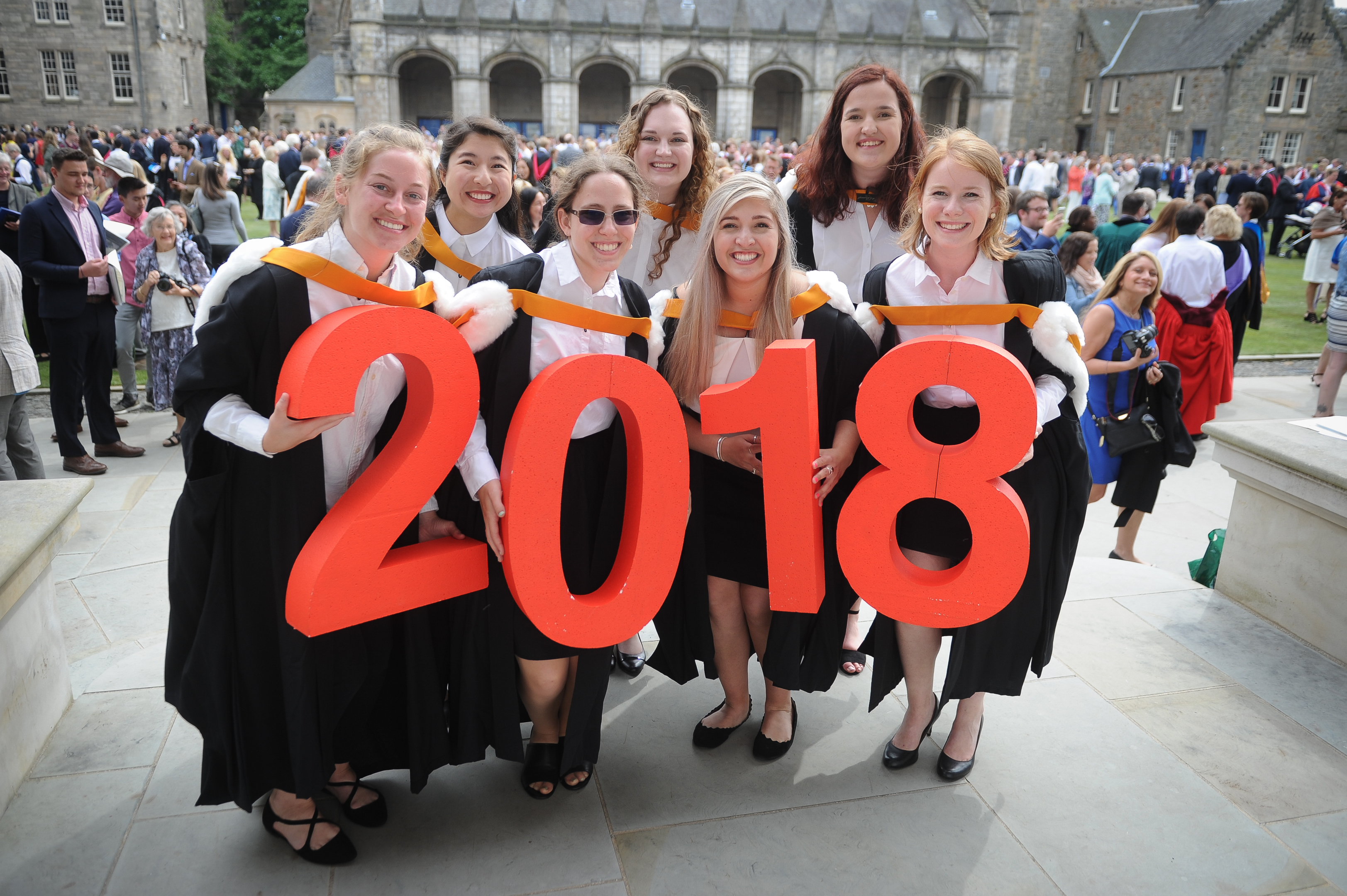 Friends who have graduated with a Joint Degree - back l to r - Anna-Leigh Ong, Georgina Farrington and Ashley Brenton - front - Raney Warner, Paula Wagner, Hannah Richman and Emily Asinger, St Salvators Quad.