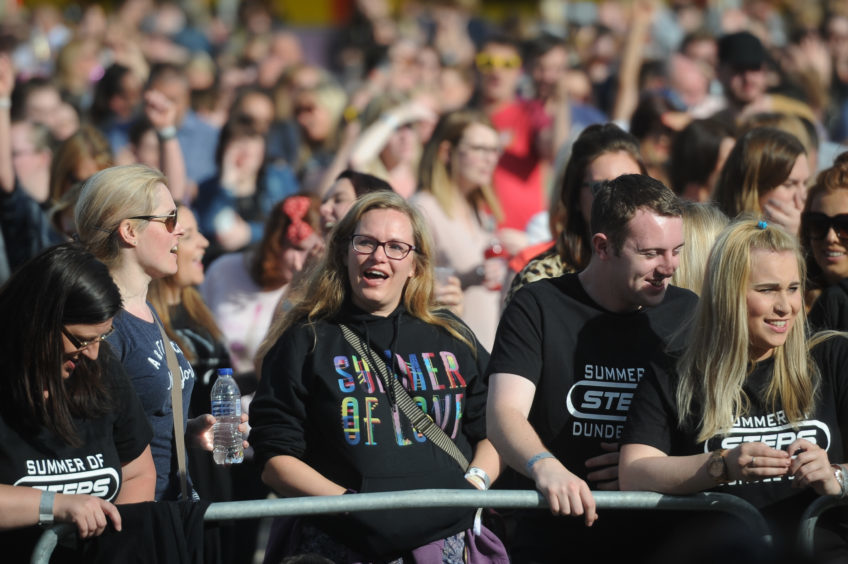 Fans watching the show at Slessor Gardens.