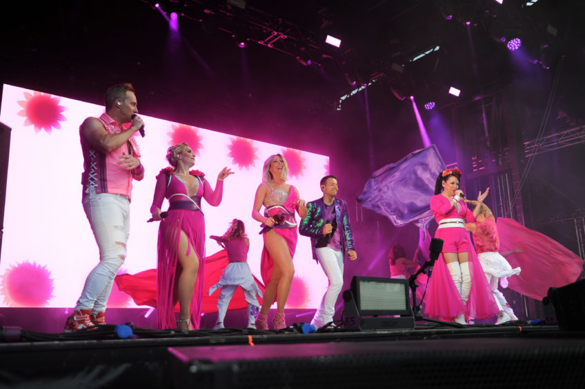 Steps on stage.